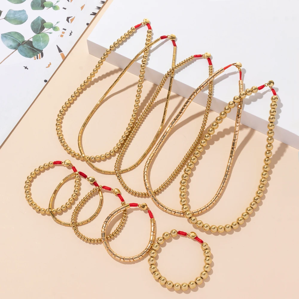 Женские браслеты из гематита и бусин золотого цвета невыцветающие круглые