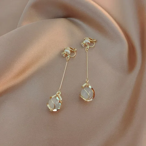 Корейская версия высококлассных жемчужных клипсов для ушей без отверстия для ушей для женщин, высококлассные висячие серьги в стиле ретро с кисточками