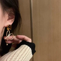 new style bow niche inlaid amber metal knotted earrings wholesale earrings for women earrings trendy 2020 stud earrings jewelry