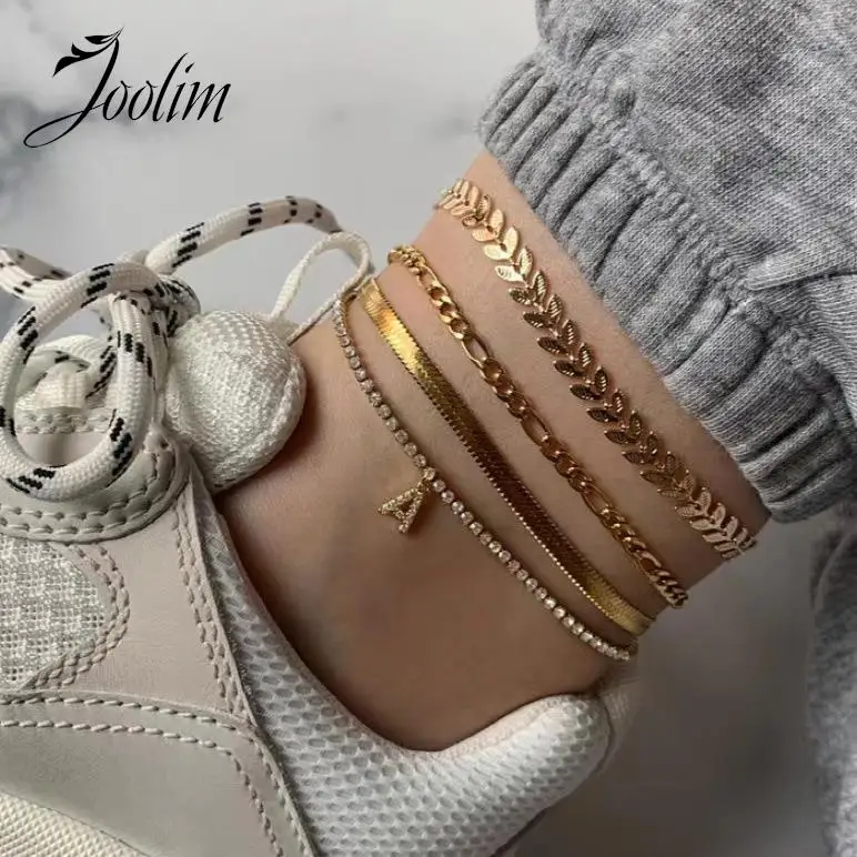 

Joolim Jewelry Wholesale 18K PVD Plated Fashion Simple Zirconia Fiargo Snake NK Arrow Chain Stainless Steel Anklet for Women