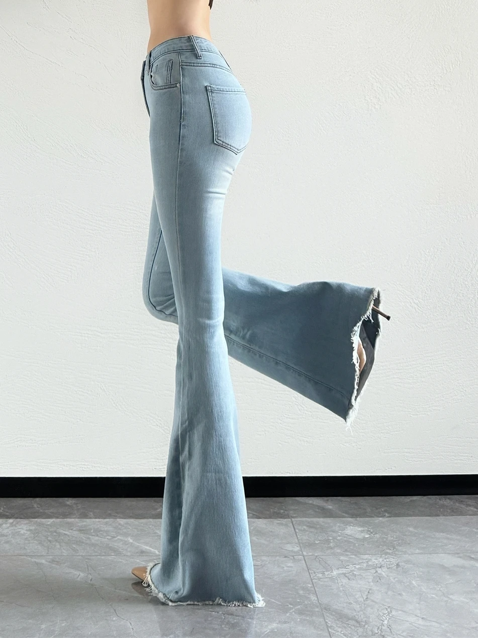 Женские джинсовые брюки с низкой талией облегающие в пол бахромой и эффектом