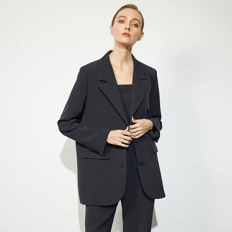 

Single Breasted loose fit jacket & cropped top with chain & straight leg pants with chain