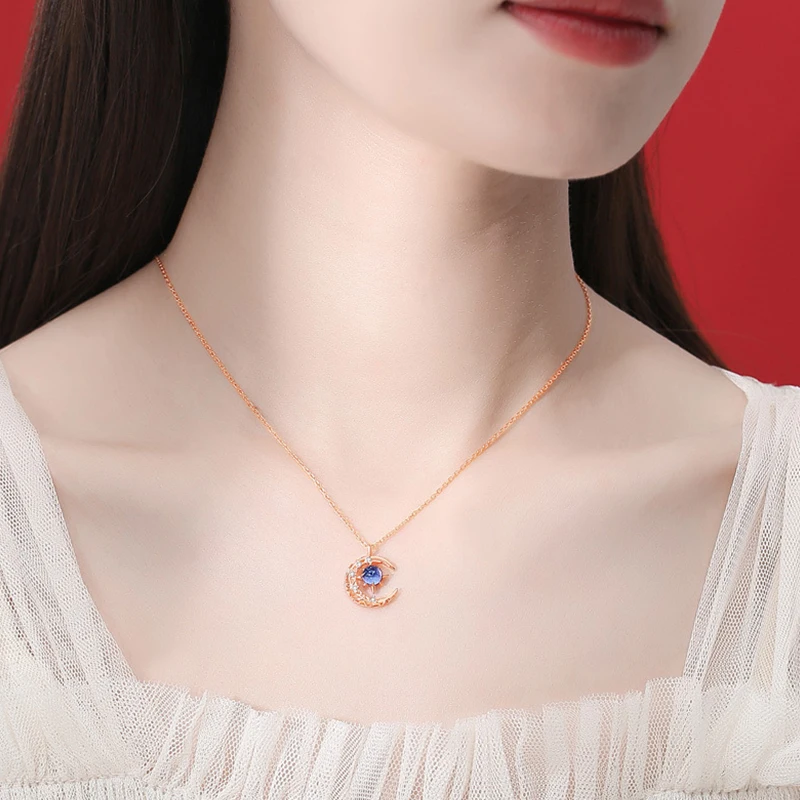 Женское колье с подвеской в виде звезд и Луны |