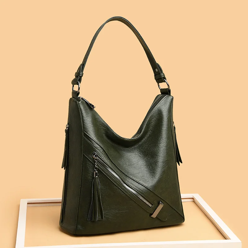 

high quality luxury brand Leather tassel motorcycle 2023 trend large capacity bucket simple atmosphere one shoulder underarm wom