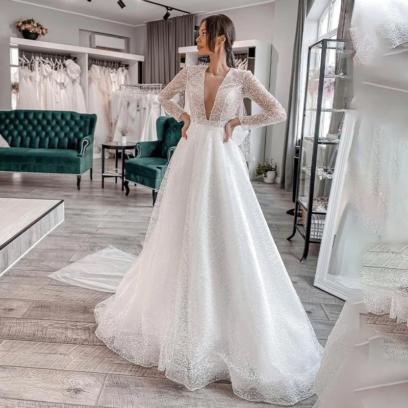 

Потрясающие вышитые бисером платья для свадьбы с глубоким V-образным вырезом, свадебные платья-трапеция с пуговицами, платье для невесты с коротким шлейфом