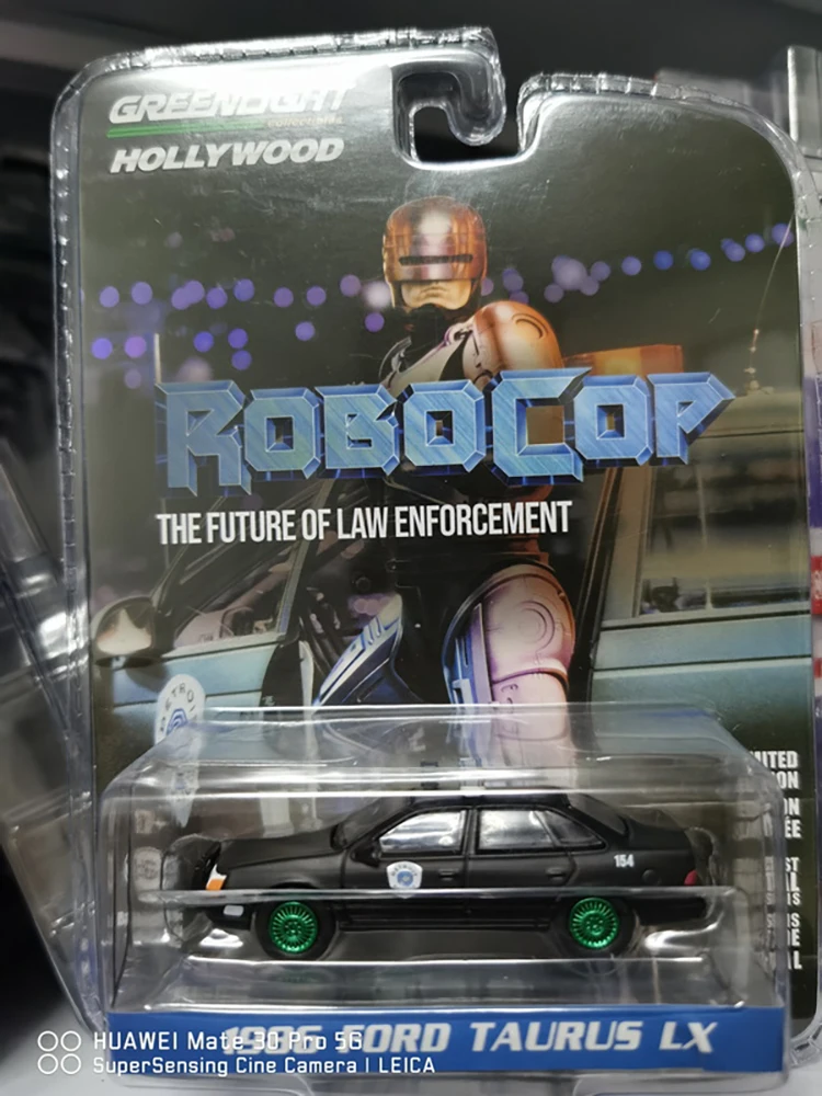 

Green Light Diecast 1/64 Scale RoboCop - 1986 Ford Taurus LX - Detroit 44940-D Green Machine Alloy Car Model Toys