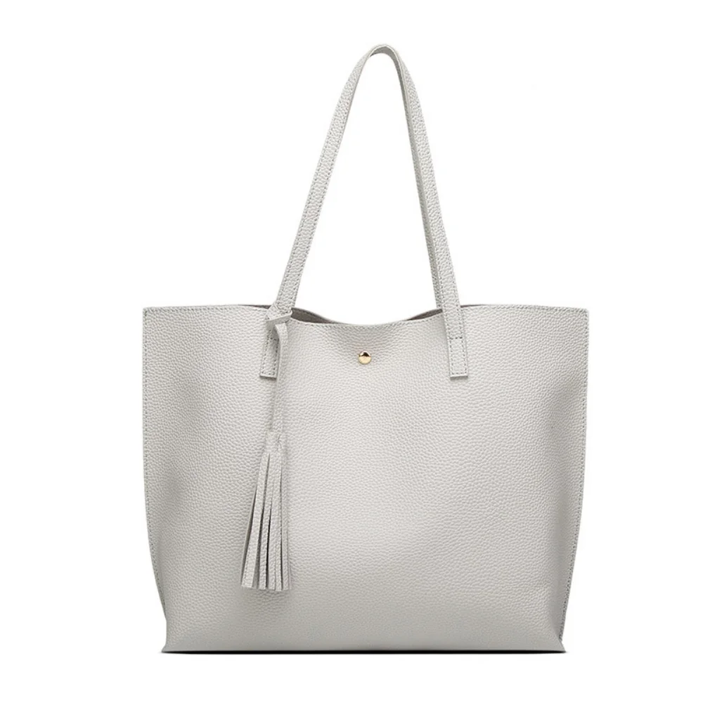 

Однотонные сумки-тоуты из искусственной кожи для женщин, роскошные дизайнерские модные дамские сумочки с кисточками, вместительная простая сумка на плечо