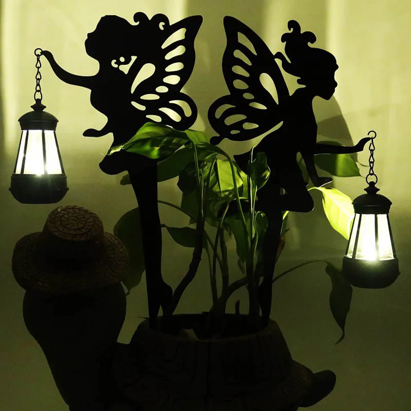 

Garden Lawn Art Statues Decorative Solar Landscape Lights Wrought Iron Flower Fairy Lanterns Are Inserted Into The Garden Lawn