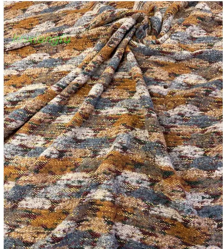 Коричнево-желтая Осенняя искусственная трикотажная ткань с красочной текстурой