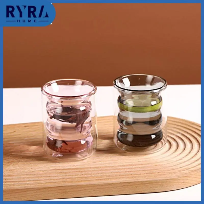 

The Circular Cup Has A Transparent Texture Double Layer Glass Insulation And Anti Scalding Color Spiral Cup And A Grip Texture