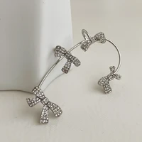 allnewme fashion full sparkly rhinestone knotted charm earrings for women girls silver color alloy clip earrings accessories