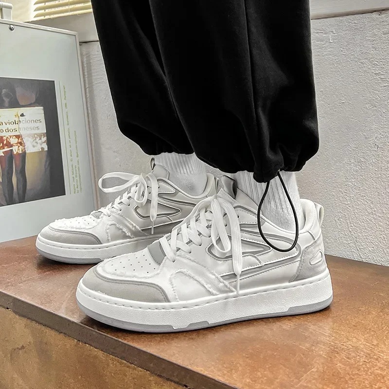 

Casual board shoes new Korean version of the trend of fashion simple German training shoes flat low-top tie fashion men's shoes