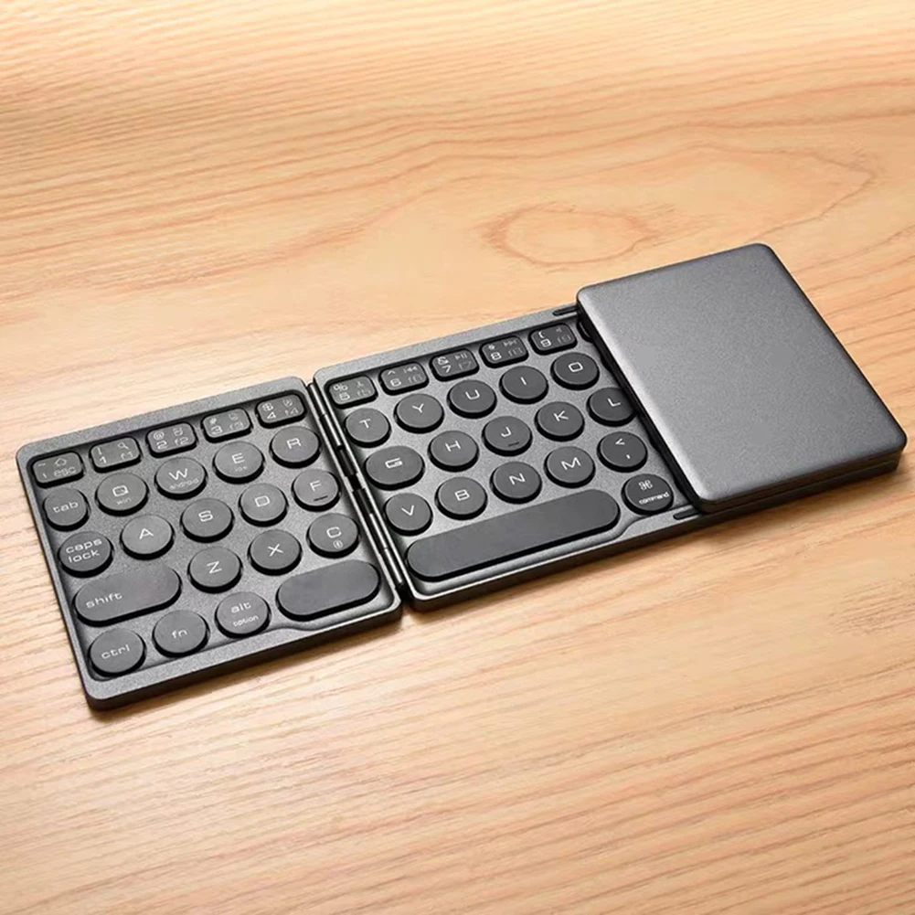 

Bluetooth-compatible Foldable Wireless Keypad Round Keycap Computer Keyboard 64 Keys Computer Wireless Keyboard for Tablet Phone