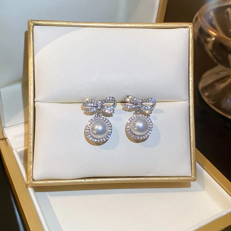 

New Zircon Bow Pearl Earrings for Women Korean High-End Temperament Earrings Fashion Light Luxury Earrings 2022