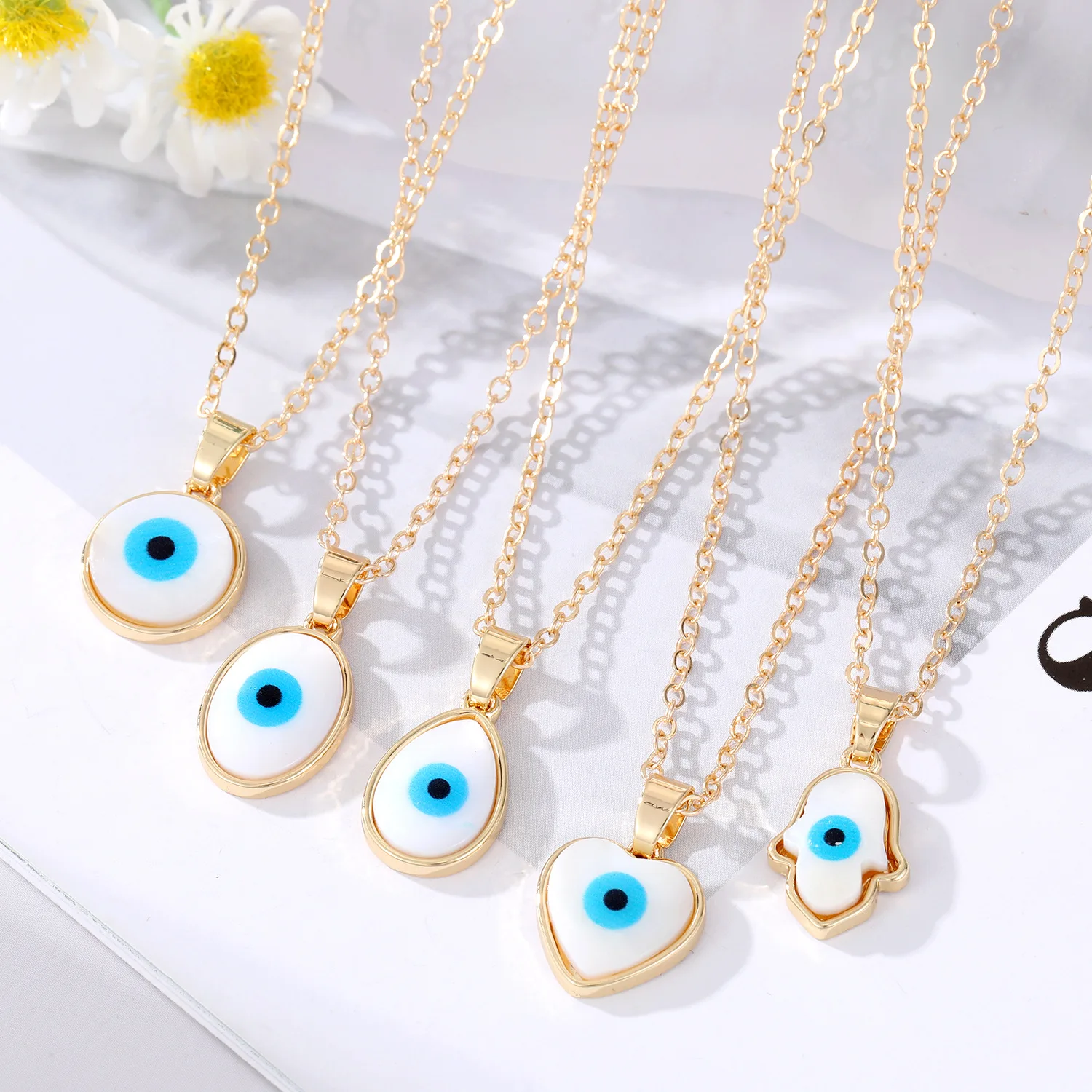 

Evil EyeResin Water Drop Heart Hamsa Hand Pendant Necklaces For Women Turkish Blue Eye Choker Necklace Party Jewelry