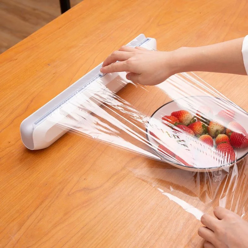 

Food Wrap Dispenser Cutter Kitchen Tool Foil Cling Film Wrap Dispenser Plastic Sharp Cutter Storage Holder