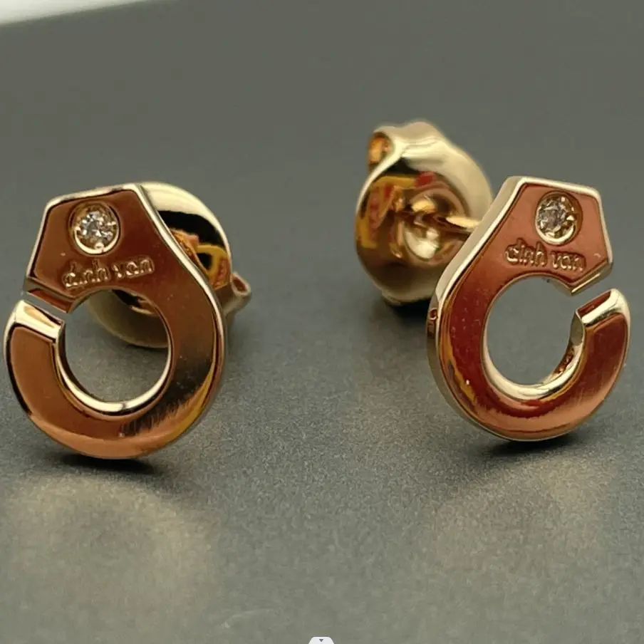 Серьги Menottes из серебра 925 пробы с фианитами и бриллиантами