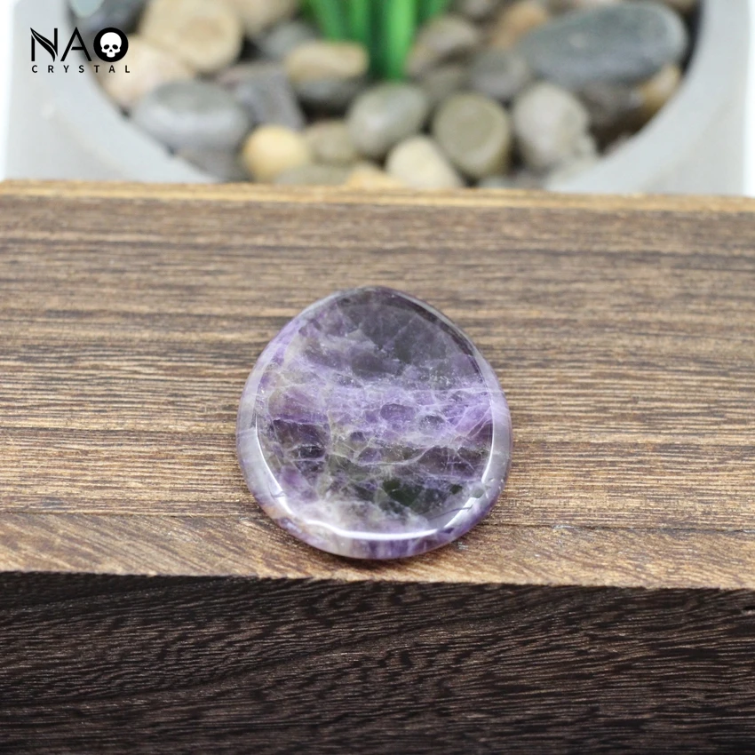 

Кварцевый массажный камень в виде капли 35x45 мм