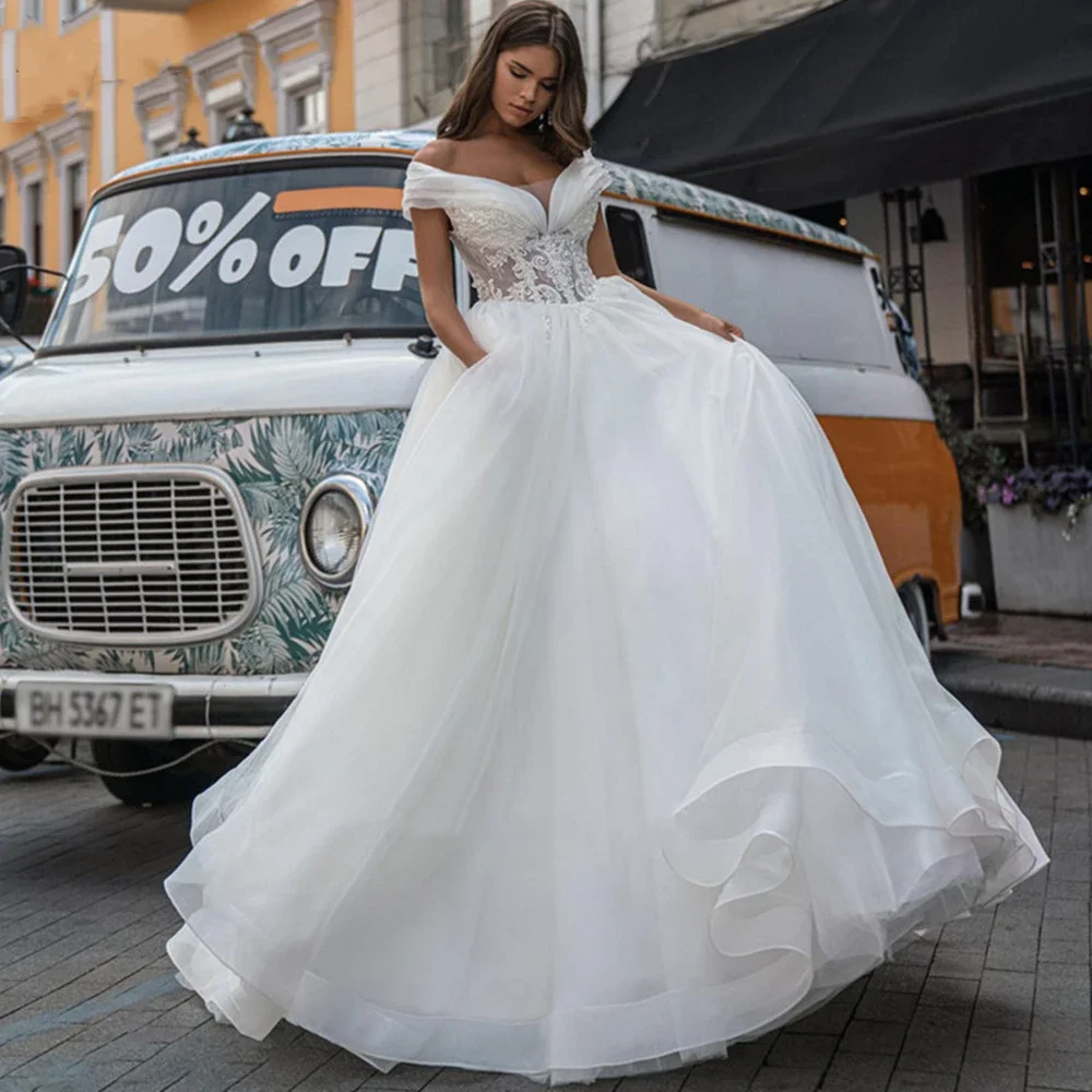 

Tulle Ball Gown Wedding Dress Appliques Off The Shoulder Sweep Train Bride Gowns Lace Up Back Pleats Robe De Mariée