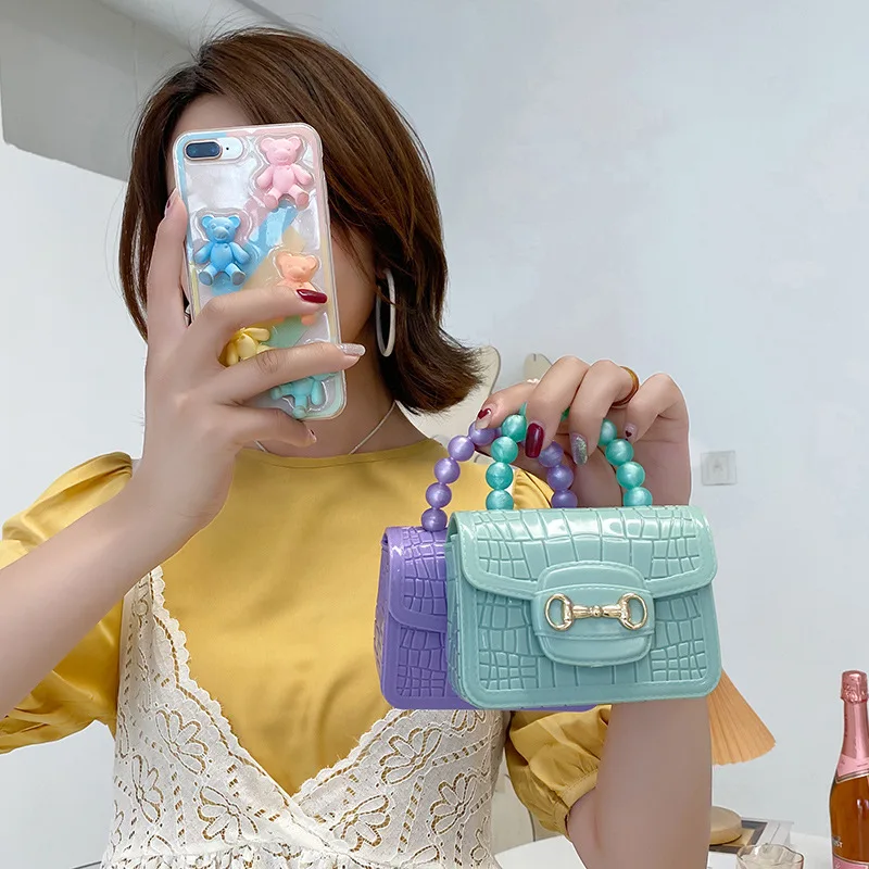 Children 2023 new Pearl color matching magnetic buckle portable mini crocodile pattern small jelly bag strapless red envelope