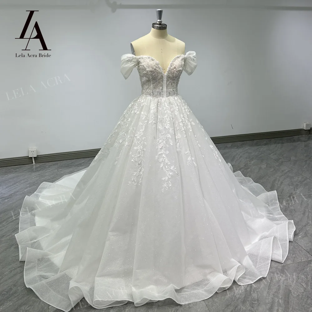 

LelaAcra Off the Shoulder Wedding Dress 2023 Sweetheart Shiny Court Train Princess Bride Gown SM27 Plus Size Vestido de Noiva