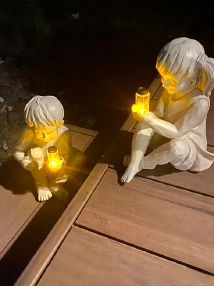 

Small-Sized 15*14*22.5CM Solar Boys and Girls Home Decorations