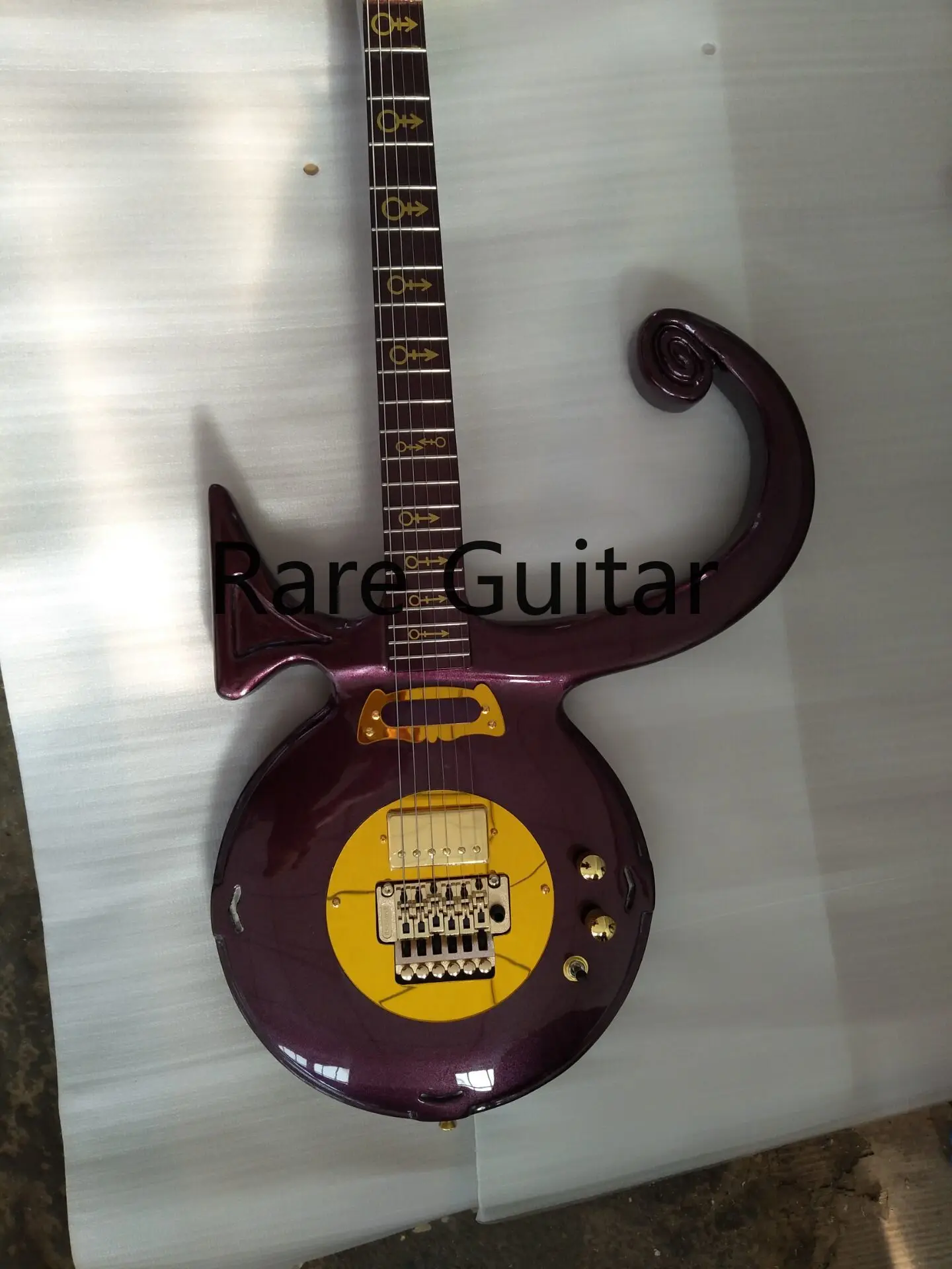 

Metallic Purple Prince Symbol Love Electric Guitar Floyd Rose Tremolo Bridge,Gold Mirror Pickguard&Back CoverSpecial Cloud Inlay