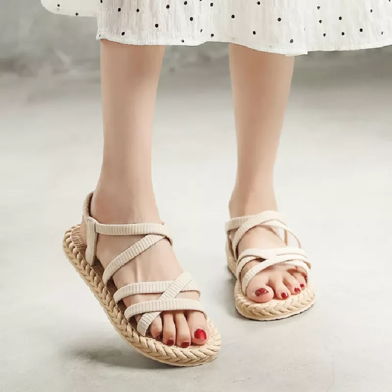 

Summer sandals outside Korea tide female imitation hemp straw tourism bottom wear flat beach flat with cool fashion slippers