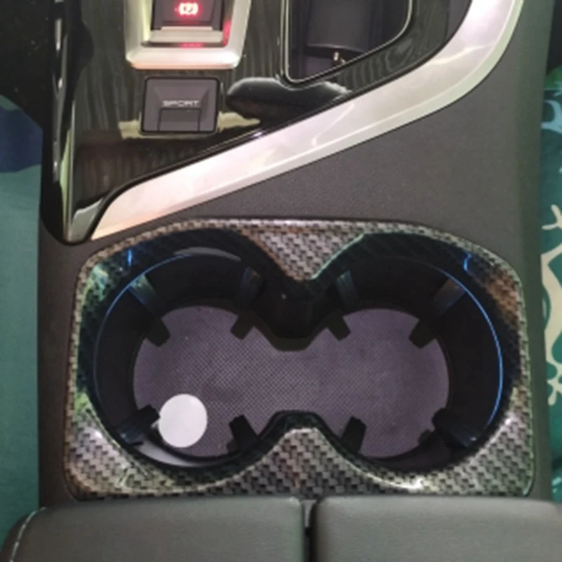 1 шт. наклейки на рамку держателя стакана для автомобиля и 2 шт. контейнера для хранения телефона на передних дверях автомобиля.