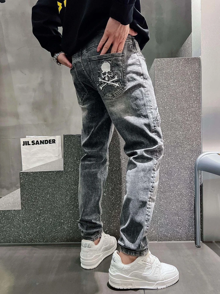 

2023 Fashion MMJ Embroidery Ripped Slim Straight Feet Fashion Skull High Quality Comfortable Micro Elastic Men's Denim Pants