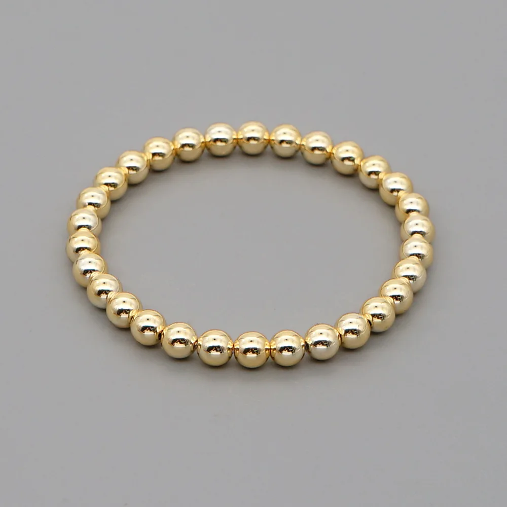 Женский браслет из акрила с позолоченными золотыми шариками в богемном стиле