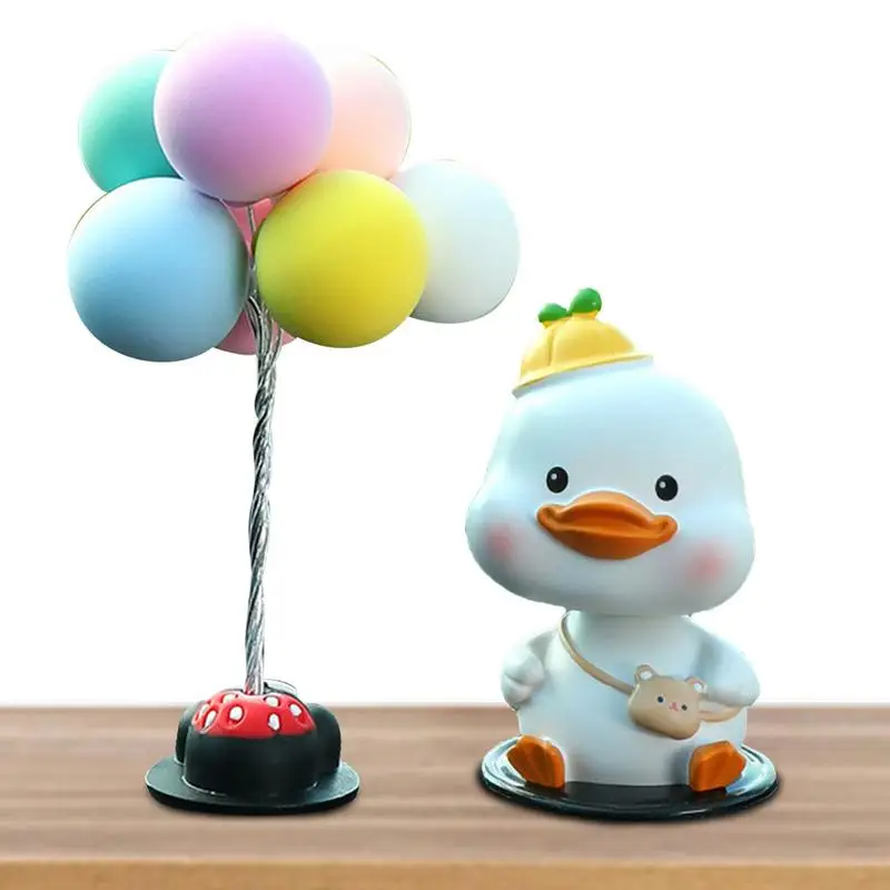 

Фотообои для приборной панели автомобиля, игрушечные украшения для автомобиля, милые маленькие искусственные украшения из смолы с вращающейся головкой и уткой