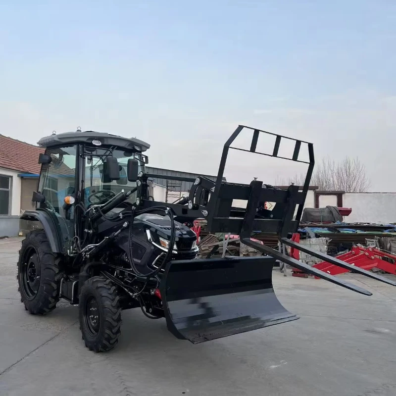 Фото Полноприводный мини-трактор 4x4 (4WD) 50-150 л.с. с кабиной для водителя, в комплекте с вилами для поддонов и снегоуборщиком, в продаже №1