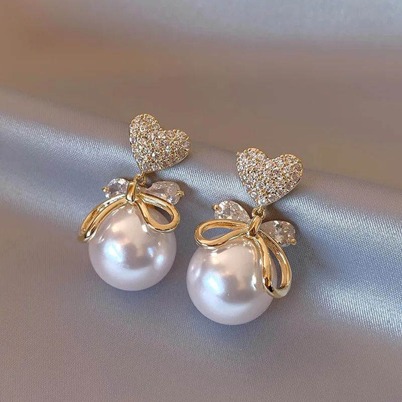 

2022 New Fahion Korea Love Imitation Pearl Earrings Elegant Bowknot Dangle Earrings For Women Fashion Water Drop Crystal Pendant