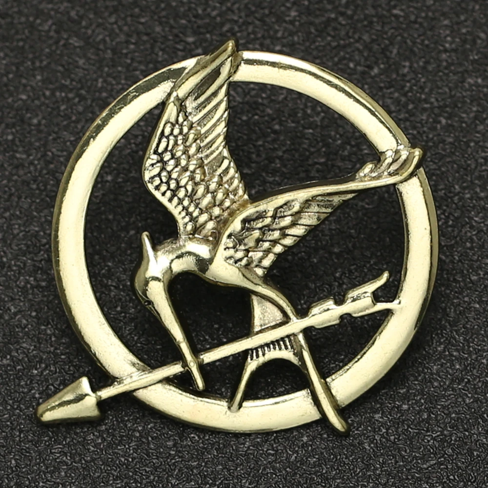 

Hunger Games Brooch Pin Bird Eagle Arrow Logo Badge Vintage Fashion Hot Animal Game Movie Jewelry For Men Women Kids Wholesale