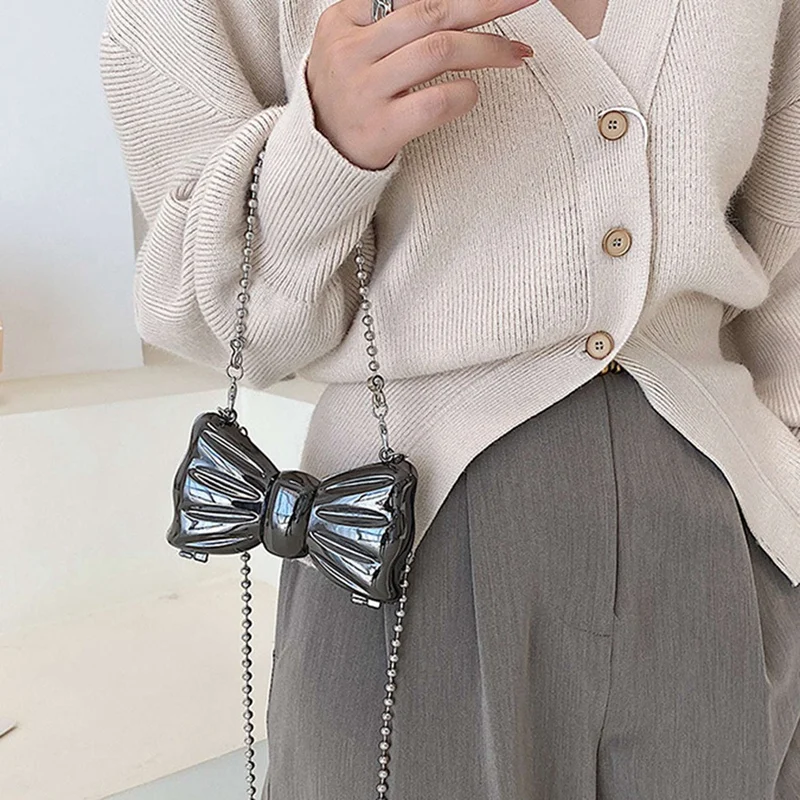 

Сумки через плечо с металлическим бантом для женщин, модные дамские сумочки на ремне, клатч, кошелек с помадой, мешки для мелочей