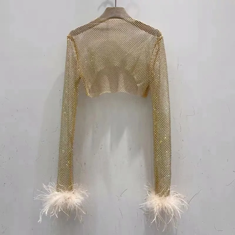 

Женский блестящий топ с длинным рукавом и фатином