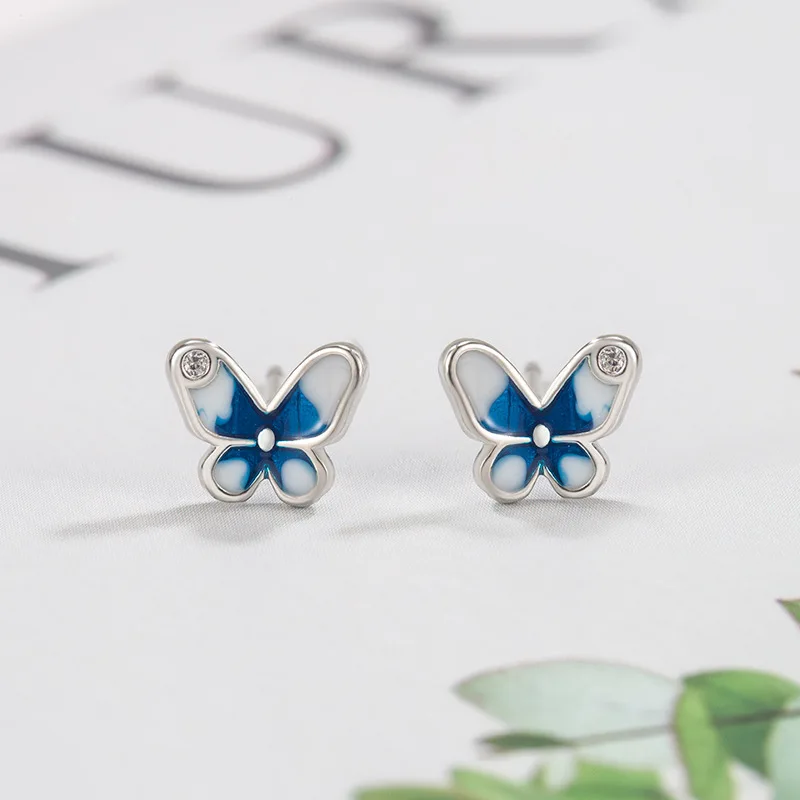 

Cute Minimal Butterfly Stud Earrings For Women Shiny Crystal Blue Epoxy Copper Ear Nail Female Romantic Earring Piercing Jewelry