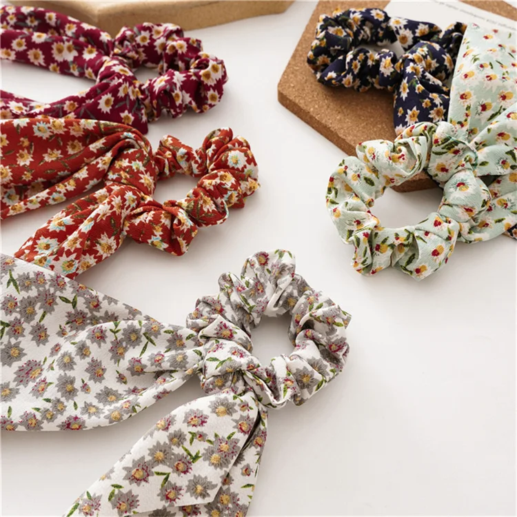 

Spring and Summer 2023 new Korean version of the sun flower printing ribbon horsetail triangle ribbon large coil hair ring hair