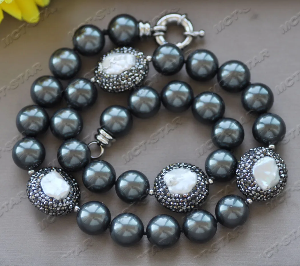 

Ожерелье MCT · STAR Z12047 21 ''23 мм Черное круглое жемчужное ожерелье с белым кубическим цирконием
