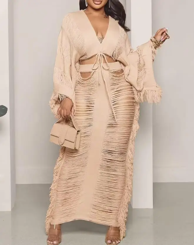 

Sexy Women's Skirt Suit 2023 Solid Color New Nightclub Clothing Short V-Neck Long-Sleeved Top and Sexy Hollow Tassel Skirt Suit
