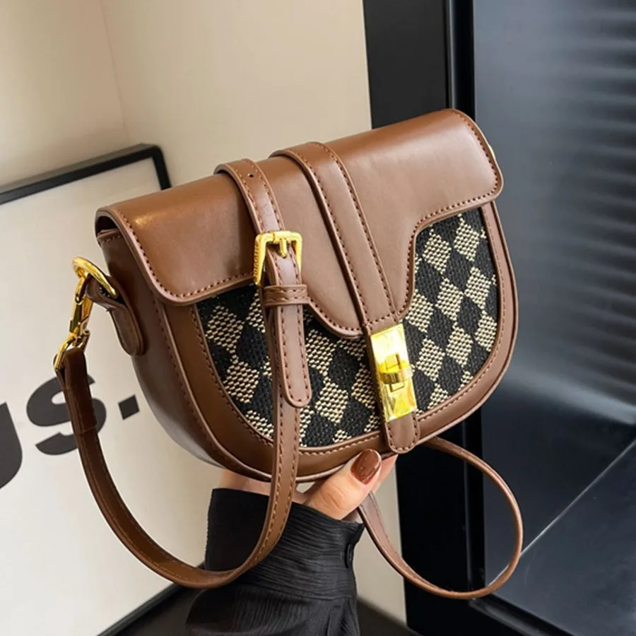 

Explosive retro senior sense of niche splicing half round armpit saddle bag tide women's bag 2023 new single shoulder diagonal c