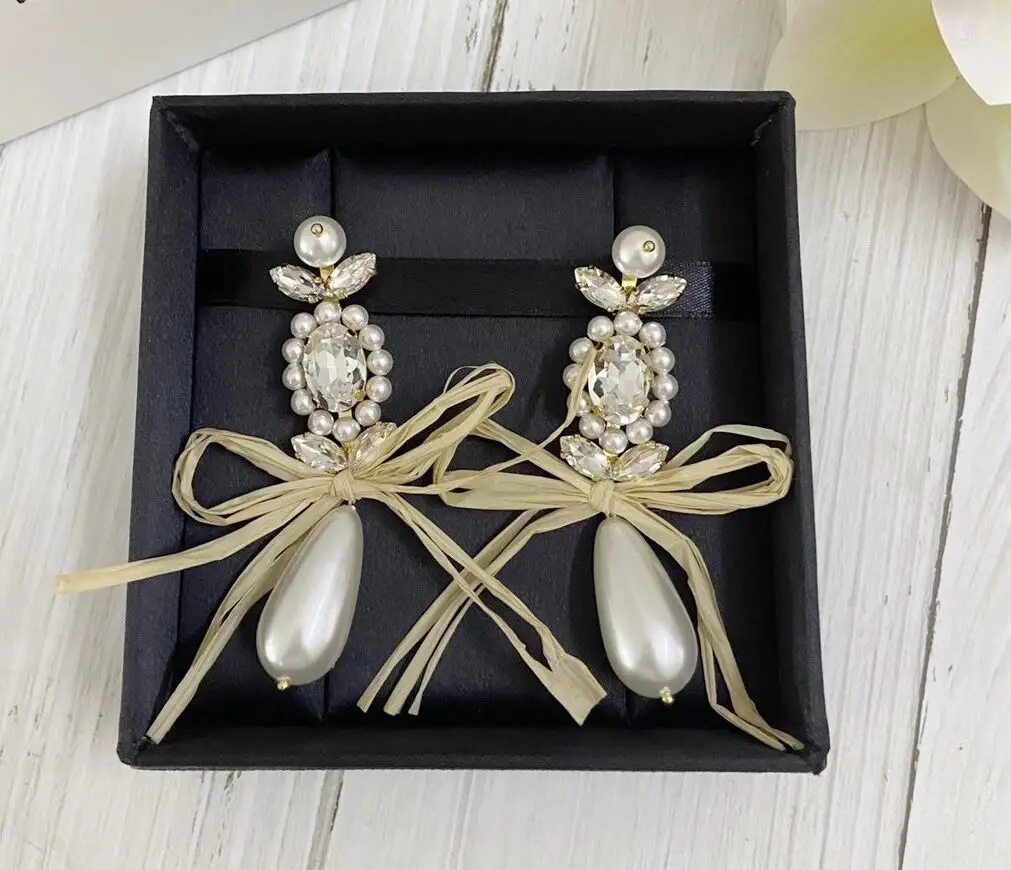 

Retro Simple Temperament Floral Lafite Bow Women'S Earrings