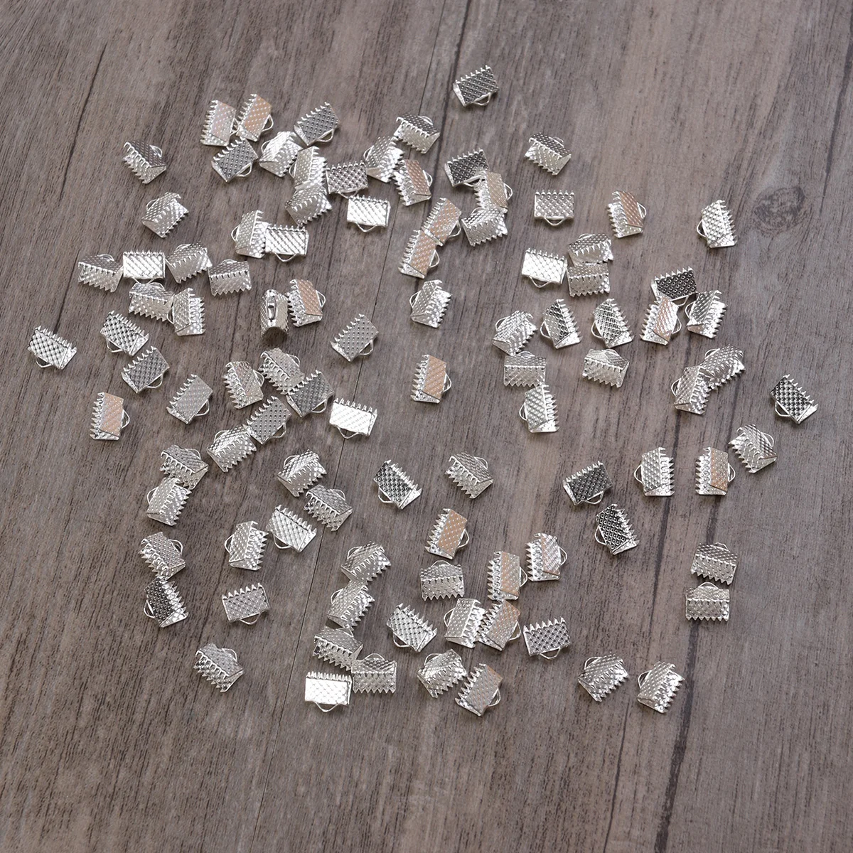 100 шт. ленты текстурированные обжимные концевые зажимы пряжки Mazi посеребренные