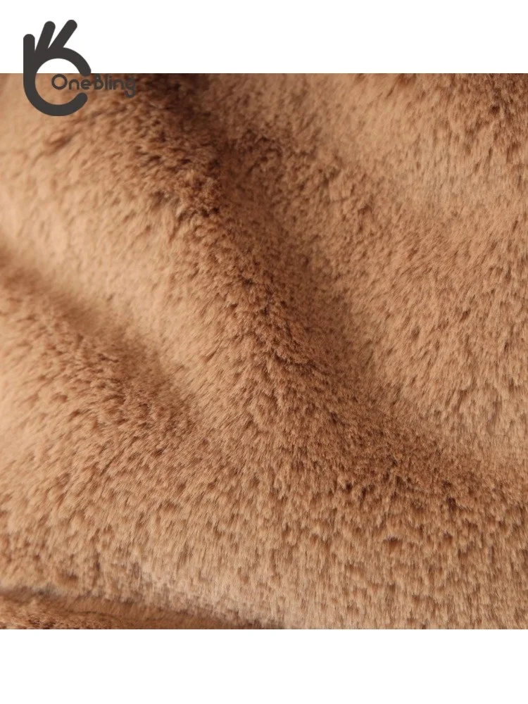 Куртка женская зимняя стеганая с воротником-хомутом и искусственным лисьим