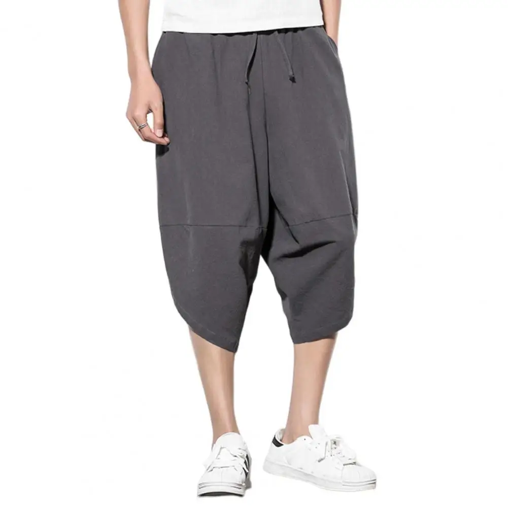 

Cropped Pants Solid Color Loose-fitting Breathable Extra Soft Sweat Absorption Dress-up Polyester Men Drawstring Baggy Pants wit