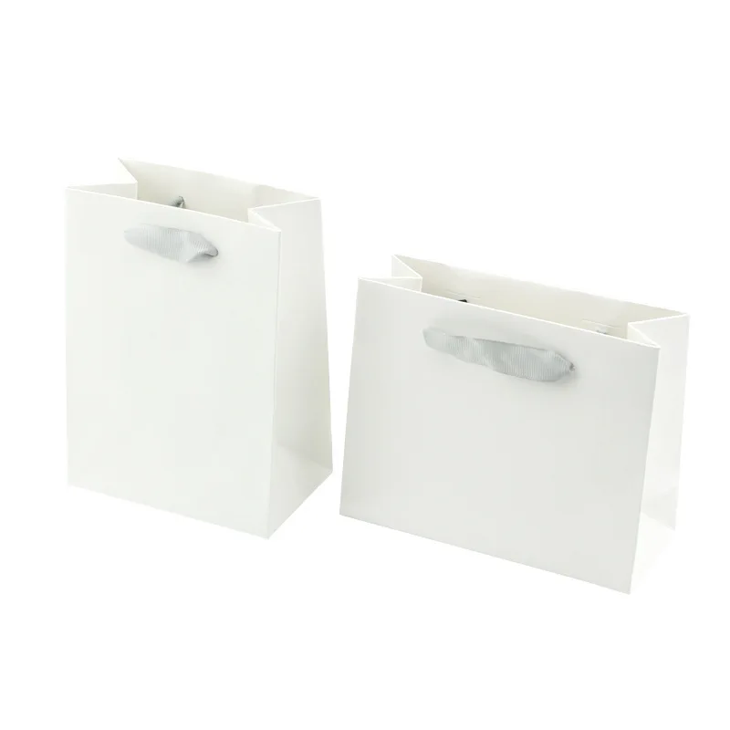 

Картонные подарочные пакеты с логотипом