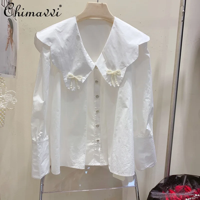 

Spring 2022 Fashion Bowknot Decorative Doll Collar Long-Sleeved Shirt Single-Breasted Loose and Simple White Blouse for Women