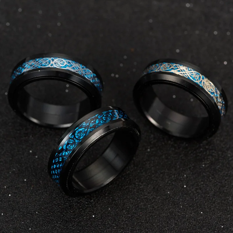 

Titanium Steel Rotating Carbon Fiber Dragon Pattern Ring Domineering Men's Rotating Decompression European and American Jewelry