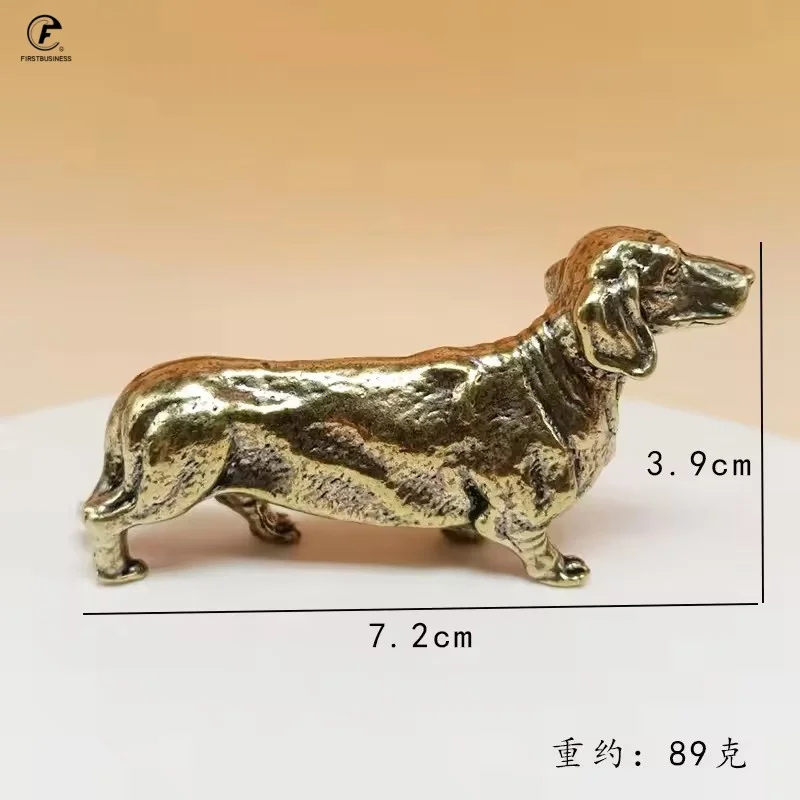 

Латунная статуэтка собаки таксы